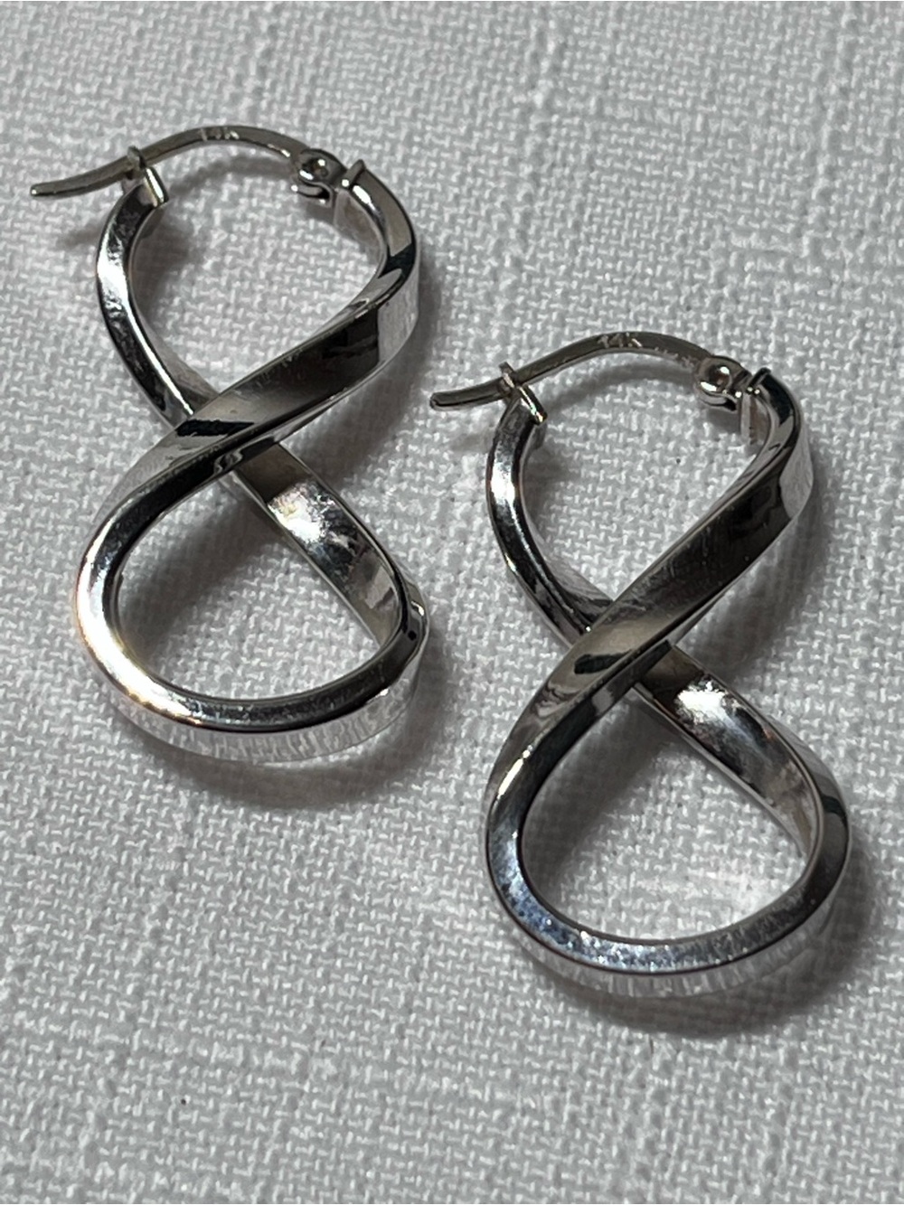 Polished Silver Infinity Loop Hoop Earrings 14k white gold. Stamped